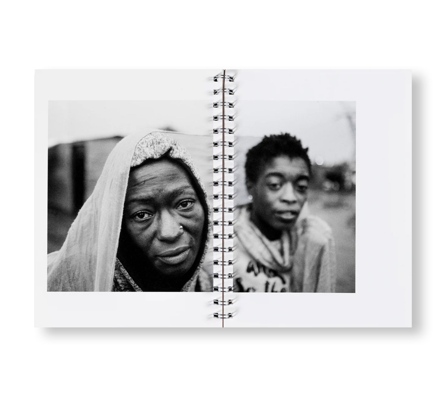 I CARRY HER PHOTO WITH ME by Lindokuhle Sobekwa