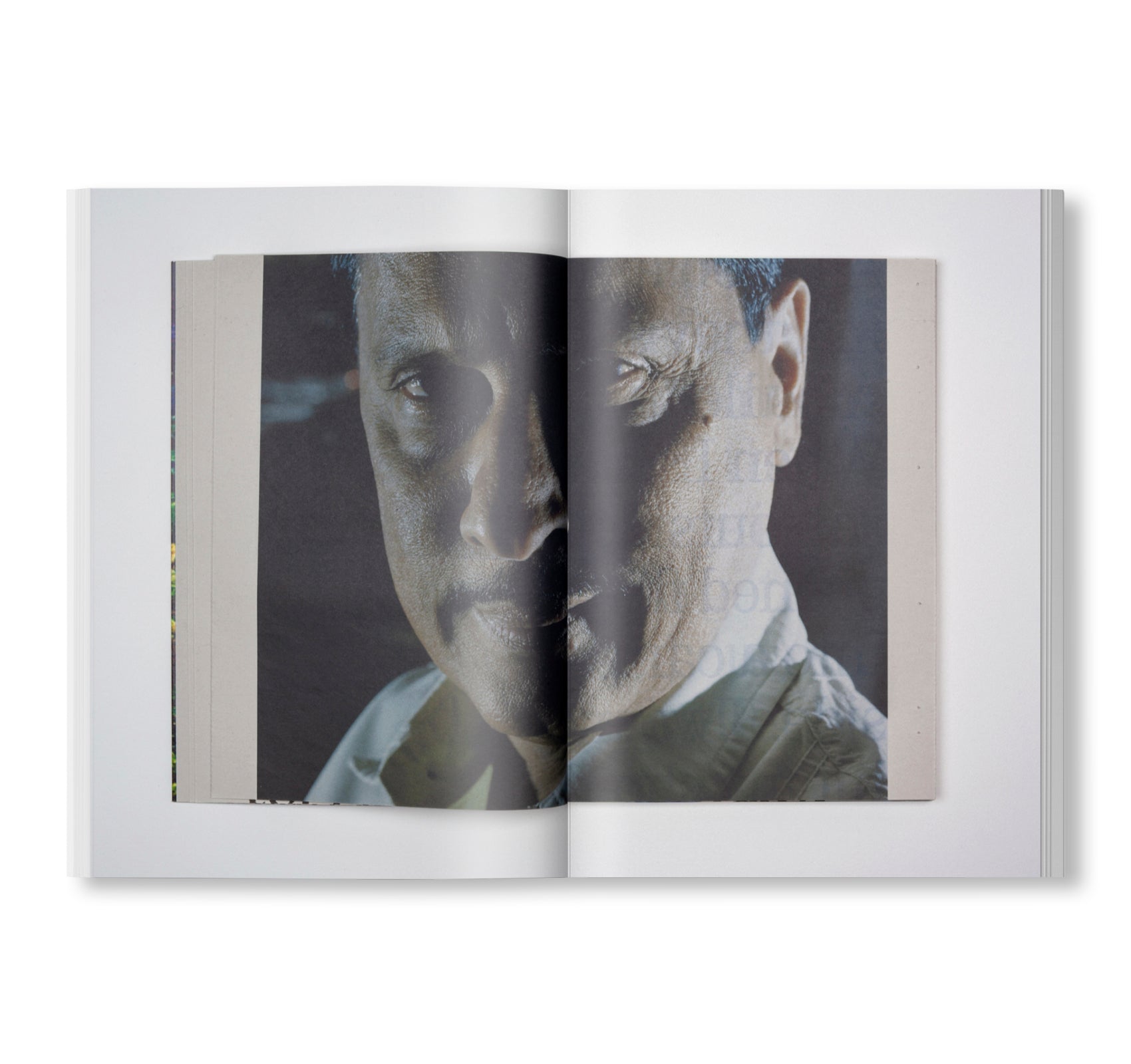 MOVING THROUGH THE SPACE OF THE PICTURE AND THE PAGE - THE PHOTOBOOK AS AN ARTISTIC AND ARCHITECTURAL MEDIUM by Stefan Vanthuyne